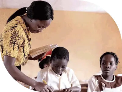 Teacher helping students